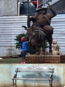 BATW Cuba Little boy petting horse sculpture